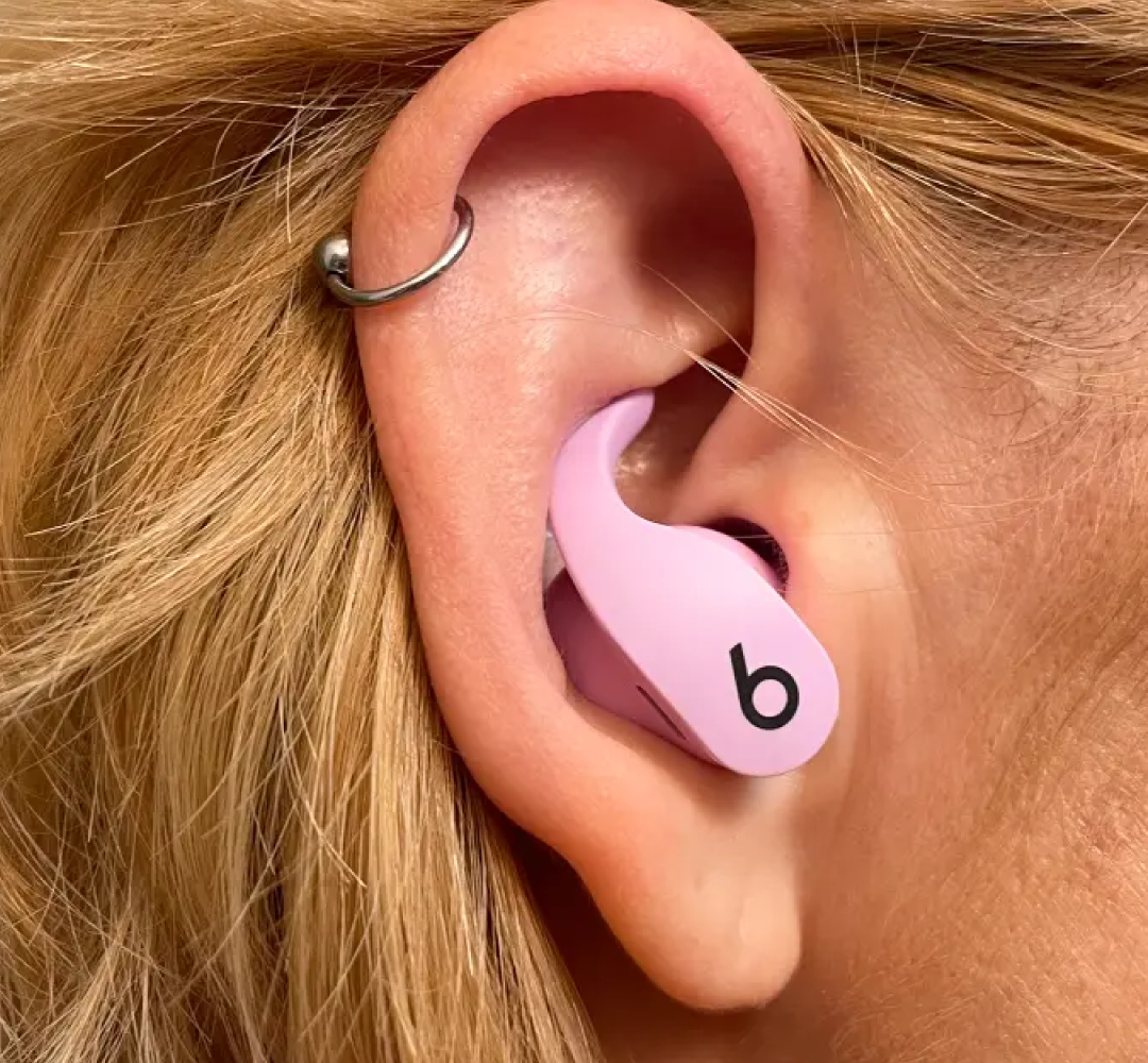Airplane cabin scenario illustrating caution for fresh ear piercings
