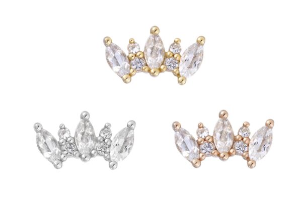 The 14K Alice earrings feature crown-shaped designs in gold, silver, and rose gold tones, all embellished with clear marquise and round gemstones. These elegant pieces are displayed on a plain white background.