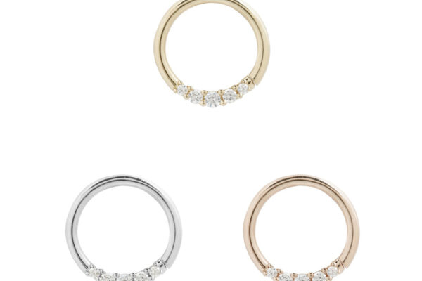 Three 14K Sophia Seam Rings with a row of small sparkling diamonds at the base are shown in yellow gold (top), white gold (bottom left), and rose gold (bottom right).