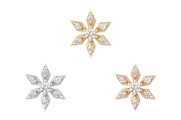 Three star-shaped earrings with six points and diamond accents. Available in 14K Chamonix, rose gold, and silver, all arranged in a triangle on a white background.