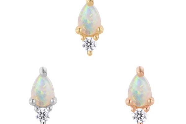 Three teardrop-shaped opal earrings, each with a small round clear stone underneath, set in 14K Daydream Gold End, rose gold, and silver-colored metal, are displayed on a white background.