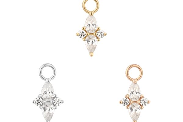 The 14K Ethereal - Charm features a marquise-shaped stone with four round accents, sparkling among other crystal charms, with gold, silver, and rose gold loops for added elegance.