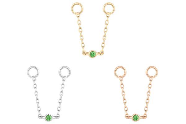 Three 14K Round Center - Chain connectors in silver, gold, and rose gold, each with a small green gemstone at the center and circular loops at both ends, are displayed on a white background.
