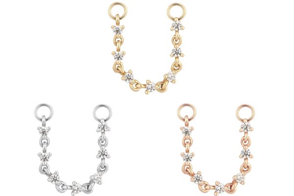 Three 14K Languid - Chain charms with flower-shaped links, shown in silver, gold, and rose gold tones, are displayed in a triangular arrangement on a white background.