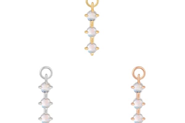 Three small, vertical drop charms, each with three round opal stones set in gold, silver, and rose gold, perfect to pair with the 14K XOXO - Charm—displayed on a white background.