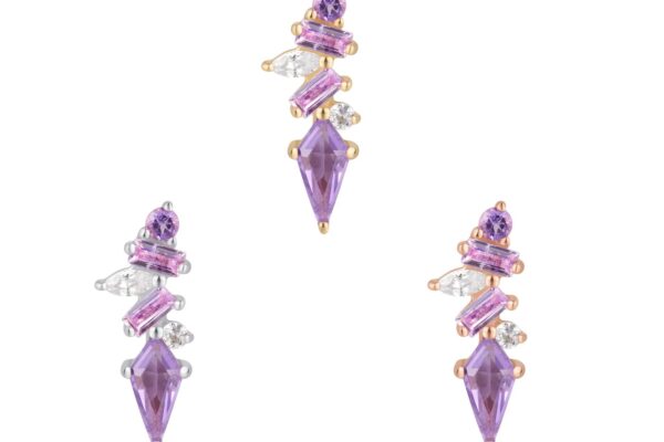 Three pairs of 14K Mixt - Amethyst earrings showcase purple, pink, and clear geometric stones, each with a pointed teardrop design at the base and angular accents above.