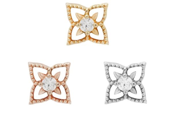 The 14K Honor earrings feature three flower-shaped studs, each with a central clear gem and delicate petal designs in gold, rose gold, and silver, finished with beaded detailing for an elegant touch.