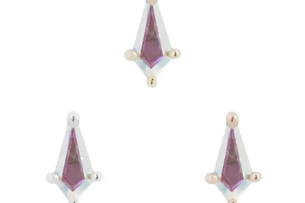 Three diamond-shaped studs with mercury mist topaz centers and gold or silver prongs—like the 14K Mini Soho - Mercury Mist Topaz—are arranged in a loose triangle on a white background.