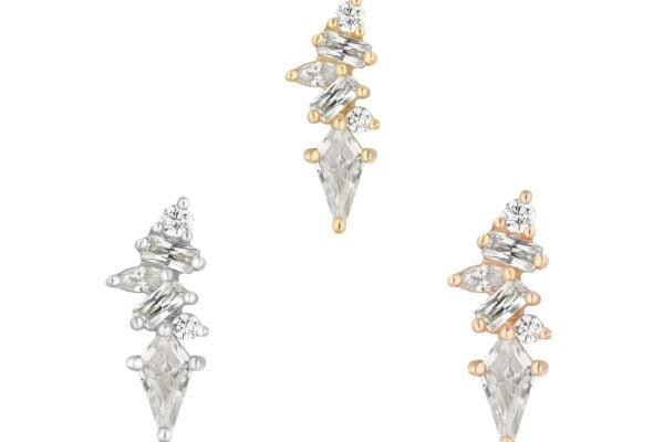 Three pairs of 14K Mixt - CZ asymmetrical earrings in white, yellow, and rose gold are shown on a white background, each featuring marquise, round, and baguette-cut clear gemstones.