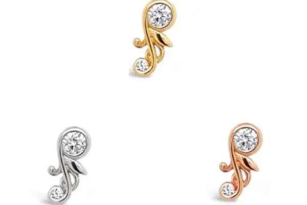 The 14K Paragon studs, shown in gold, silver, and rose gold tones, each feature a curved Cz End design with two clear gemstones and are displayed on a white background.