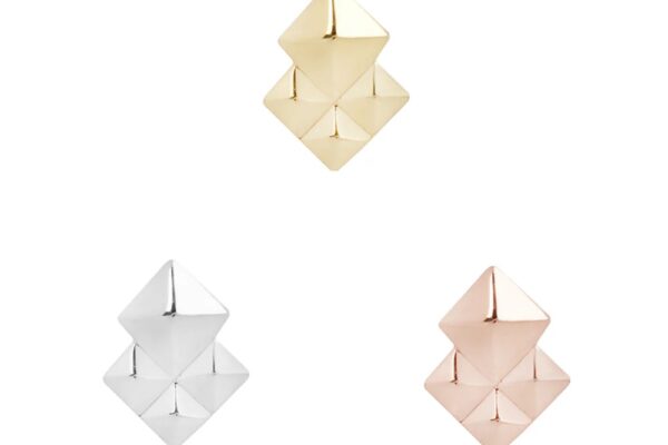 Three pairs of pyramid-shaped stud earrings are displayed: one 14K Pyxis Gold pair at the top, a silver pair at the bottom left, and a rose gold pair at the bottom right, all set against a white background.