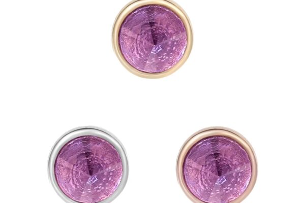Three round stud earrings with purple amethyst gemstones: two in 14K gold bezel settings (14K Round Bezel Reverse Set - Amethyst) and one in a silver setting, displayed against a white background.