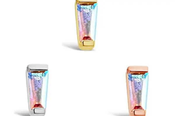 Three prism-shaped iridescent Mercury Mist Topaz charms, named 14K Tapered Baguette, are shown in gold, silver, and rose gold settings against a white background.