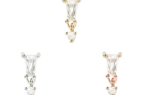Three pairs of 14K Yves earrings are shown, each with a baguette-cut clear stone above a smaller triangular one, set in yellow gold, rose gold, or white gold—the signature Yves Cz End design.