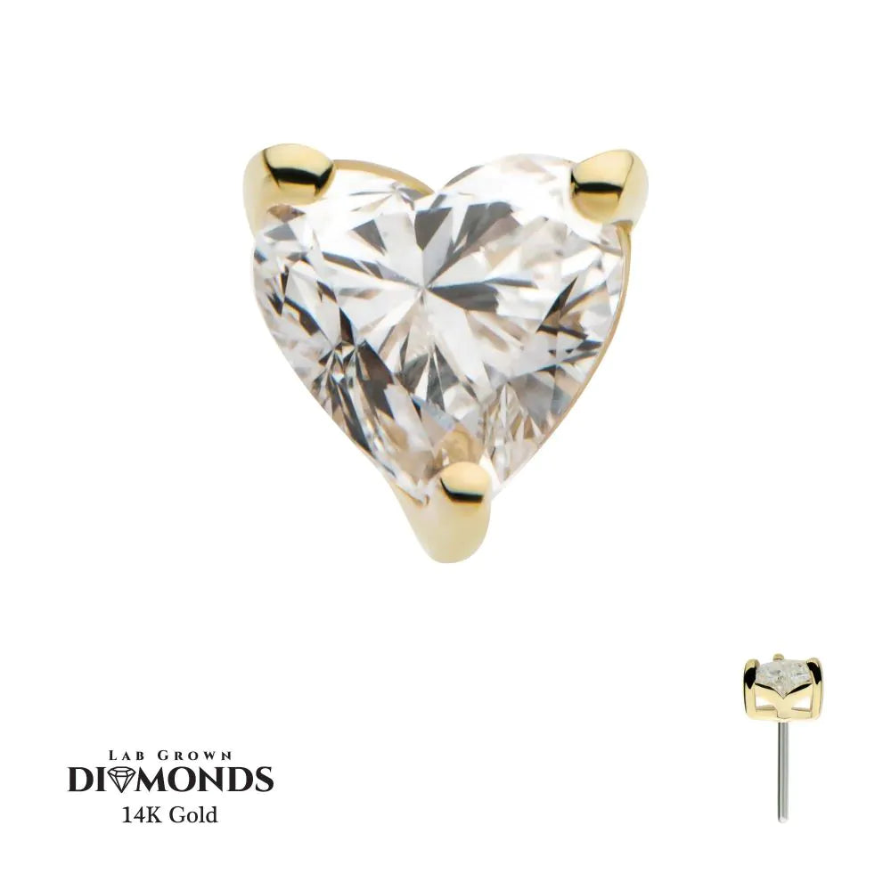 A 14K Prong Heart - Diamond earring featuring a heart-shaped lab-grown diamond, shown from front and side views on a white background. Text reads: Lab Grown Diamonds 14K Gold.