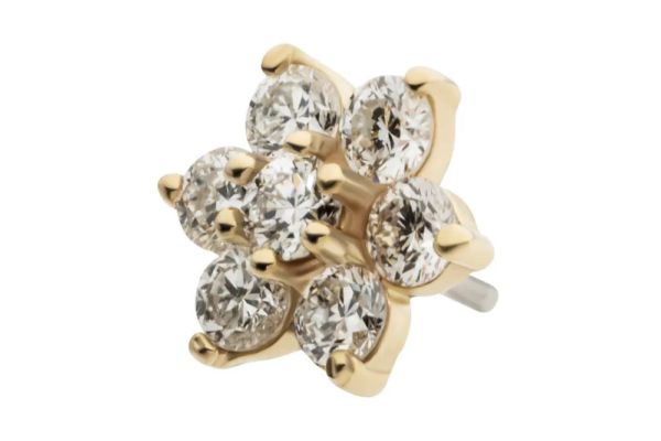 The 14K Prong Flower - Diamond earring features seven round diamonds in a delicate floral design, each securely set in gold prongs.