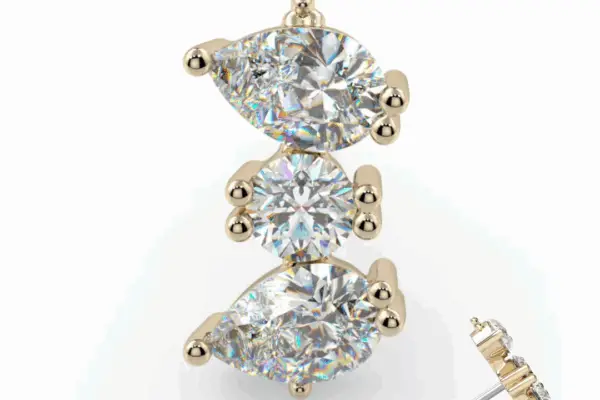 The 14K Mimir gold threaded top earring showcases two pear-shaped and one round CZ stones arranged vertically, with a side view displaying the post and setting details.