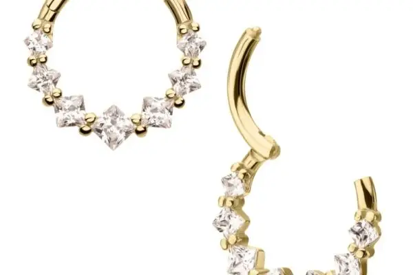 The 14K Prong Princess Clicker earrings each feature seven prong-set princess-cut clear stones along the lower half. One earring is open, the other closed, highlighting their elegant clicker mechanism.