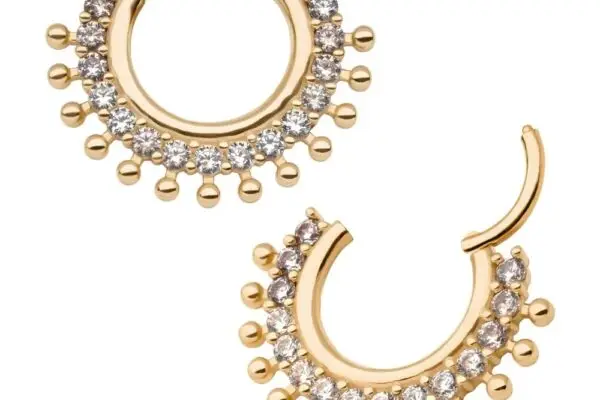 A pair of 14K 15-Beaded Gem Clicker hoop earrings with small round diamonds on the front and gold bead accents along the edge; pictured with one earring closed and the other slightly open.