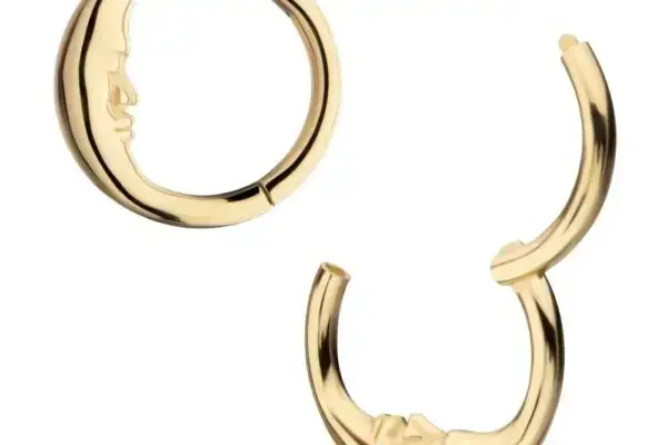 Two 14K Moon Face Clicker gold hoop earrings, each with a raised crescent moon face in profile—one closed and one partially open to display its secure clasp mechanism.