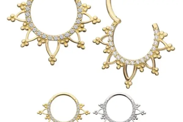 Four ornate hoop earrings, two gold and two silver, display decorative pointed patterns and gemstones. The gold pair, with one being the 14K Beaded Edge Clicker, is at the top left and bottom left; the silver pair is at the bottom right.