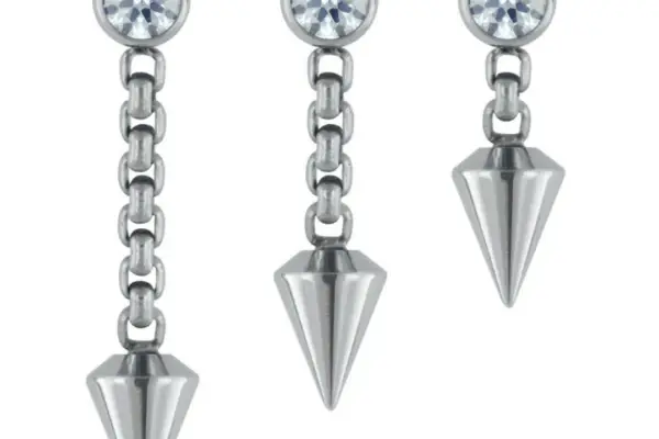 Three silver earrings, each with a round clear gemstone stud, short chain, and Spear Dangle pendant; two have longer chains and match, while the third earring has a shorter chain design.