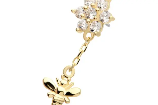 The 14K Bee & Flower Dangle features a cluster of clear gemstones in a flower design with a gold bee charm hanging from a delicate short chain.