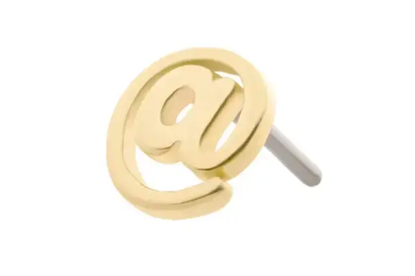 The 14K At Symbol stud earring features a sleek gold @-shaped design with a silver post, shown elegantly on a plain white background.