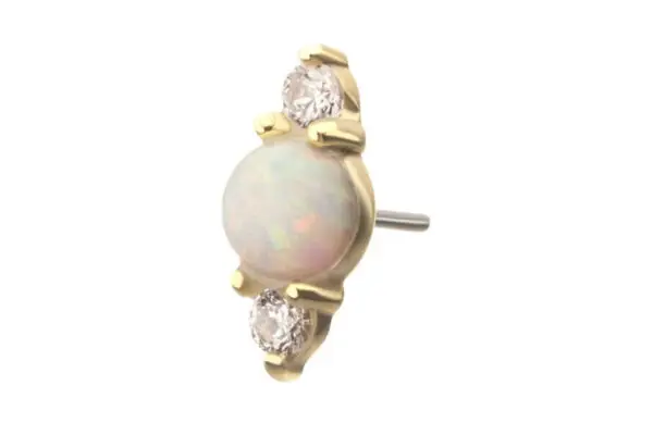 The 14K Whimsical Cluster stud earring features a central round opal accented by two small round white stones above and below, all set in a minimalist gold design.