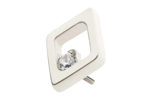A modern, square-shaped silver earring inspired by the Rhombus Gem, featuring a hollow center and a small round clear gemstone at one corner, displayed on a white background.