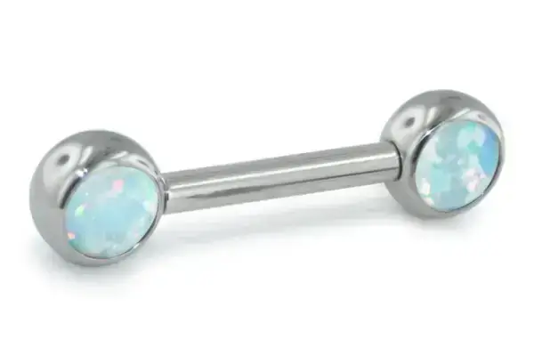 The Opal Nipple Barbell features a silver bar with round ends, each set with a light blue opalescent gem that shimmers softly with pink and green highlights.