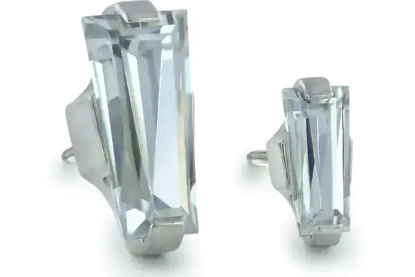 A pair of Titanium Baguette Cut Prong Gem Ends featuring large, clear, rectangular gemstones in modern angular prong settings, displayed on a white background.