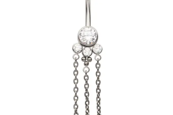 The Tri-Bead Dangle belly button ring features one large and three small clear gems set in titanium, accented by three elegant dangling chains.