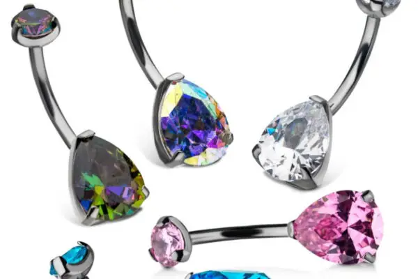 The Teardrop Prong pack includes five titanium and silver-toned belly button rings with large prong-set gemstones—pink, blue, white, dark iridescent, and multicolored—in teardrop and round shapes. Ideal for navel piercings.