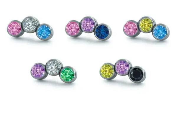 Five Petite Clusters - Pride stud earrings, each featuring three gems in Transgender, Bisexual, Pansexual, Genderqueer, and Nonbinary flag colors with matching icons to represent LGBTQ+ pride.