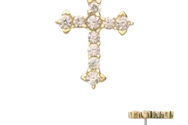 The 14K Antique Cross is a gold stud earring featuring round white gemstones. Its backing is displayed separately below and to the right of the earring.