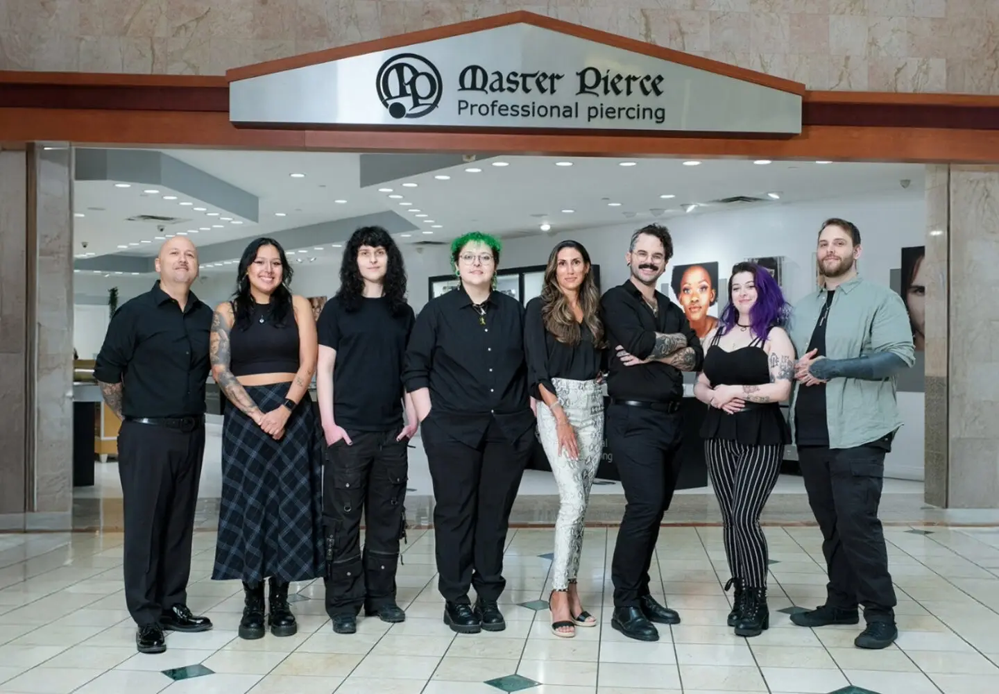 Master Pierce tattoo & piercing studio team in action