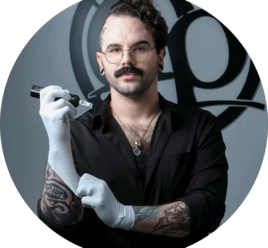 Matt De La Torre Kintz, Head Tattoo Artist at Master Pierce, showcasing neotraditional tattoo art