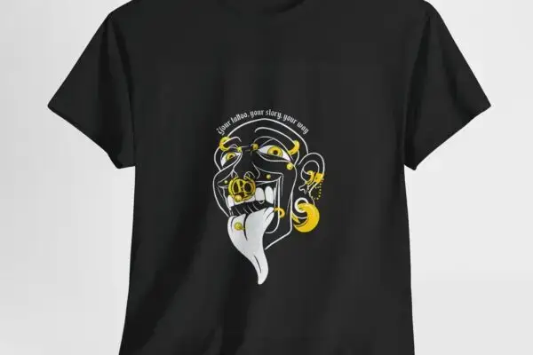 Unisex Graphic T-Shirt in black with a striking white and yellow stylized face—bold eyes, piercings, tongue out—and the text “Upon whom your story your way” above the graphic.
