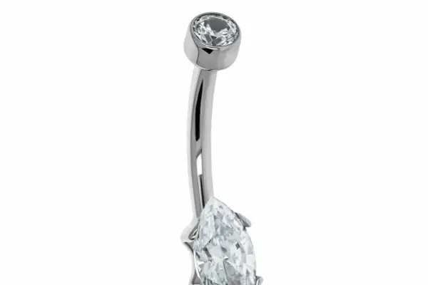 The Marquise is a titanium navel curved barbell with a round clear gem on one end and a larger marquise-cut clear gem on the other.