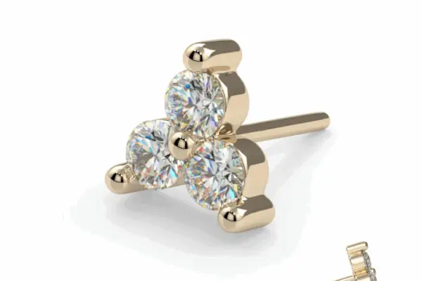 The 14K Trinity features three round, clear gemstones in a triangular prong-set cluster. A side view of the earring appears in the bottom right corner.