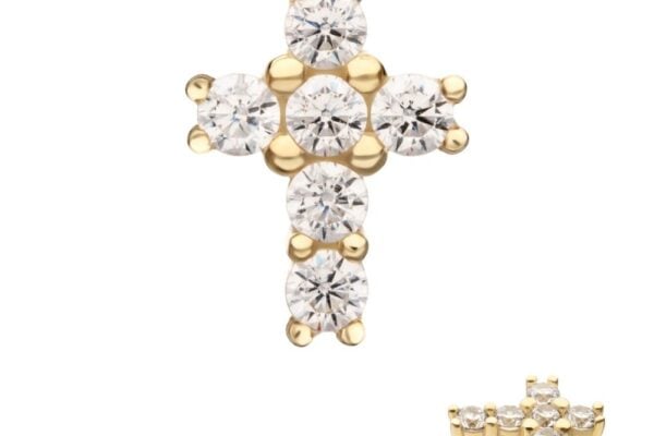 The 14K Gem Cross is a gold stud earring shaped like a cross with seven round clear gemstones. A smaller corner image displays the side view, emphasizing its three-dimensional design.