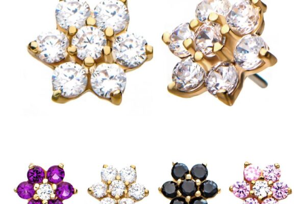Six pairs of 14K 7-Petal Flower stud earrings, each with gold settings and six gemstones in white, purple, black, and pink tones, are elegantly displayed against a white background.