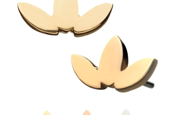 Four metallic earrings with a three-petal lotus design and the 14K Flat Leaf Top are shown in gold, rose gold, black, and silver. The main focus is on the gold version, displayed from various angles.