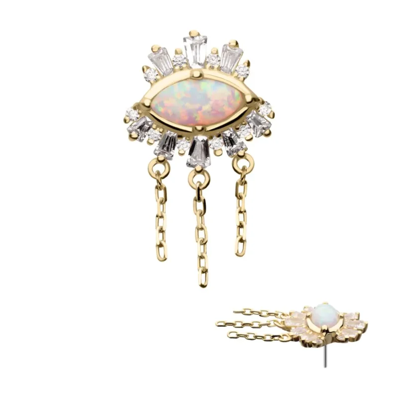 The 14K Evil Eye & Triple Dangle Chain earring features a central opal, white crystal surround, and three dangling chains. A side view showcases its thickness and the elegant chain detailing.