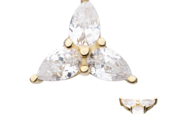The 14K Trinity Teardrop features three marquise-cut clear gemstones set in a triangular pattern, with a side view inset highlighting the elegant design.