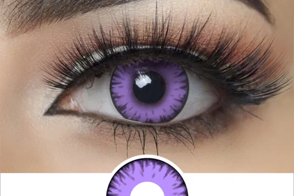A close-up of an eye wearing Magister - Violet Vampire contacts, showcasing vibrant purple lenses with a black outer ring and streaks. The eye features long lashes, well-groomed brows, and subtle makeup.