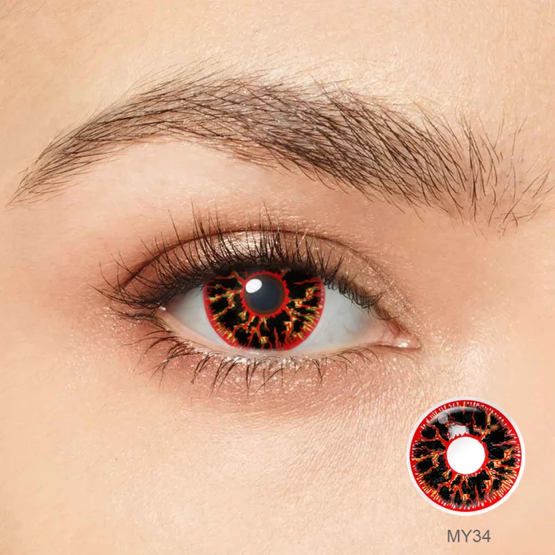 A close-up of an eye wearing Magister - Red Vein contacts, showcasing a bold black and red fiery pattern. An inset displays a detailed view of the lens design labeled MY34.
