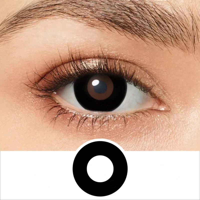 A close-up of a human eye with a large black circle beneath it on a white background highlights the shape similarity between the pupil and EYECON Black Out, evoking its unique visual effect.