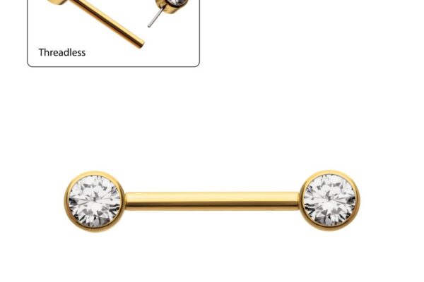 A gold barbell piercing with clear gemstones on both ends. Inset shows a single earring post and gem with the label Threadless. Simple design on a white background.